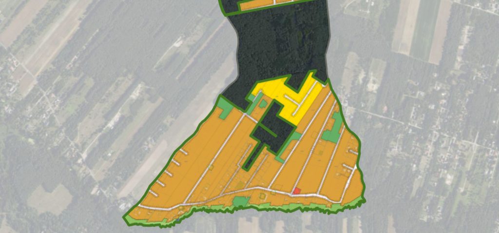 Mapa z zaznaczonymi na różna kolory obszarami ma mapie terenowej